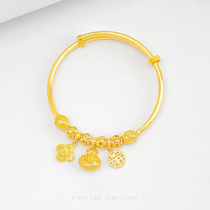 Prosperity Baby Bangle in 916 gold by Chip Lee, symbolising luck, love and tradition in a timeless keepsake child bangle.