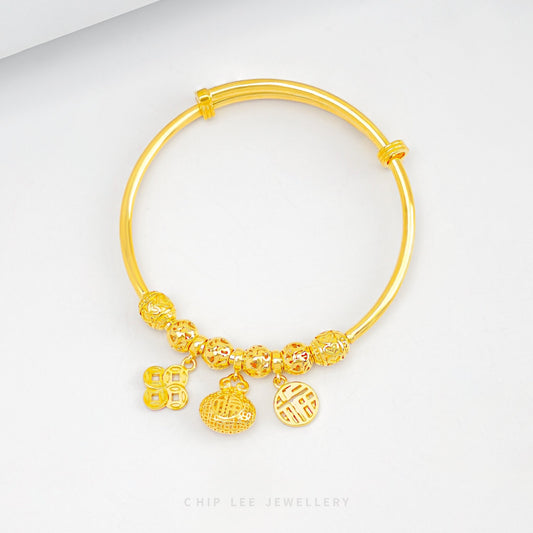 Prosperity Baby Bangle in 916 gold by Chip Lee, symbolising luck, love and tradition in a timeless keepsake child bangle.