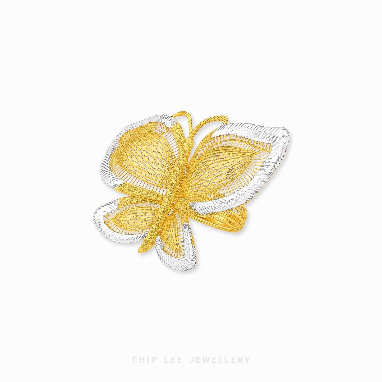 A butterfly-shaped ring by Chip Lee Jewellery, featuring textured yellow gold wings and body with silver-toned outer edges, set against a plain white background.
