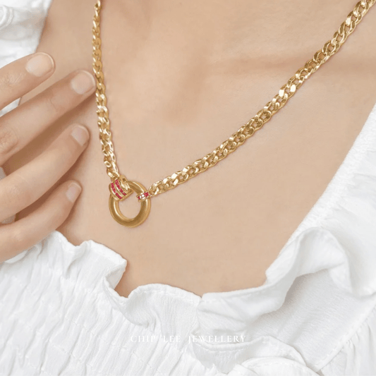 Lightweight and elegant solid 916 gold circular chain necklace with red cubic zirconia design. Hallmarked by Singapore Assay Office for certified purity and authenticity.