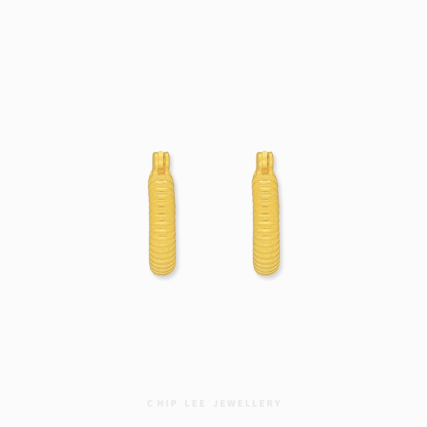 Chip Lee Jewellery Singapore Ribbed Hoop Earrings 916 Gold for women. Contemporary textured gold hoops. Elegant daily wear accessory.