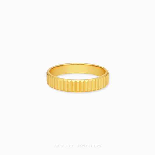 Gold ring with ribbed texture on a white background, branded 'Chip Lee Jewellery'.