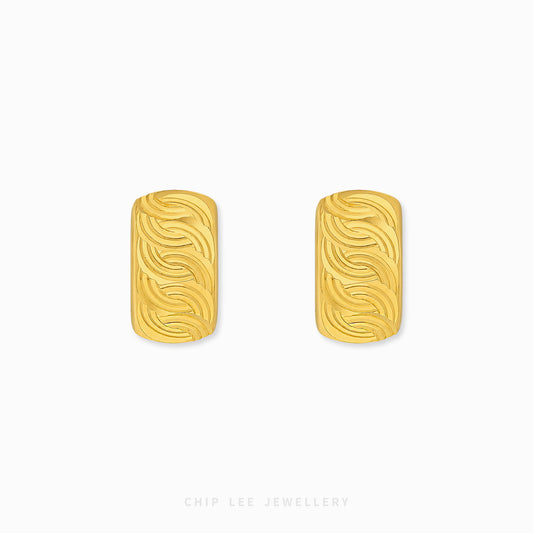 Ripple hoop earrings featuring elegant wave-inspired textured detailing.
