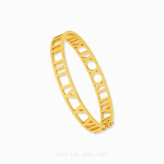 Elegant 22K gold geometric cutwork bangle with modern openwork design and polished finish