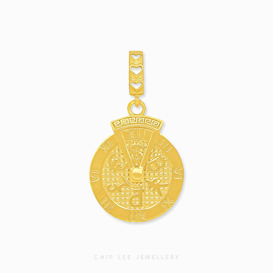 A gold charm with a rotating Roman numeral design.