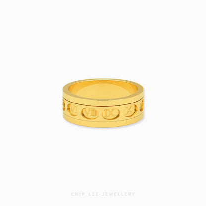 Gold rotating Roman numerals ring with engraved spinner band design