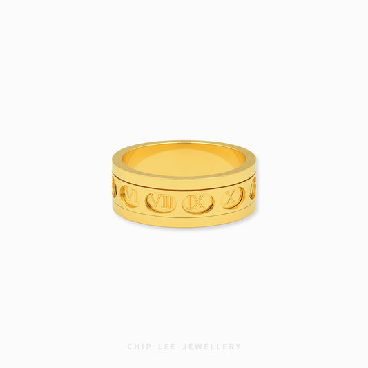 Gold rotating Roman numerals ring with engraved spinner band design