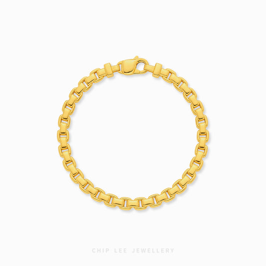 Luxury gold round box link bracelet featuring polished interlocking links with a sleek minimalist statement design.