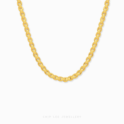 Minimalist gold round box link necklace with polished interlocking chain design.