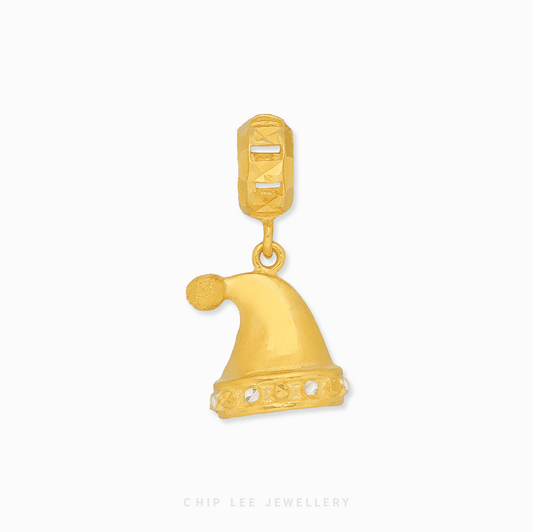 916 Gold Santa Hat Charm by Chip Lee Jewellery Singapore. Festive Santa hat charm symbolizing holiday joy, warmth, and seasonal cheer.