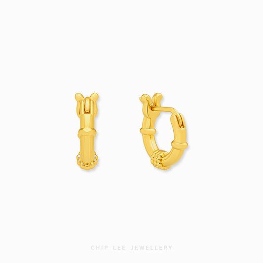 A pair of gold huggie hoop earrings with a textured bamboo-inspired design, shown on a clean white background with the brand name 'CHIP LEE JEWELLERY' at the bottom.
