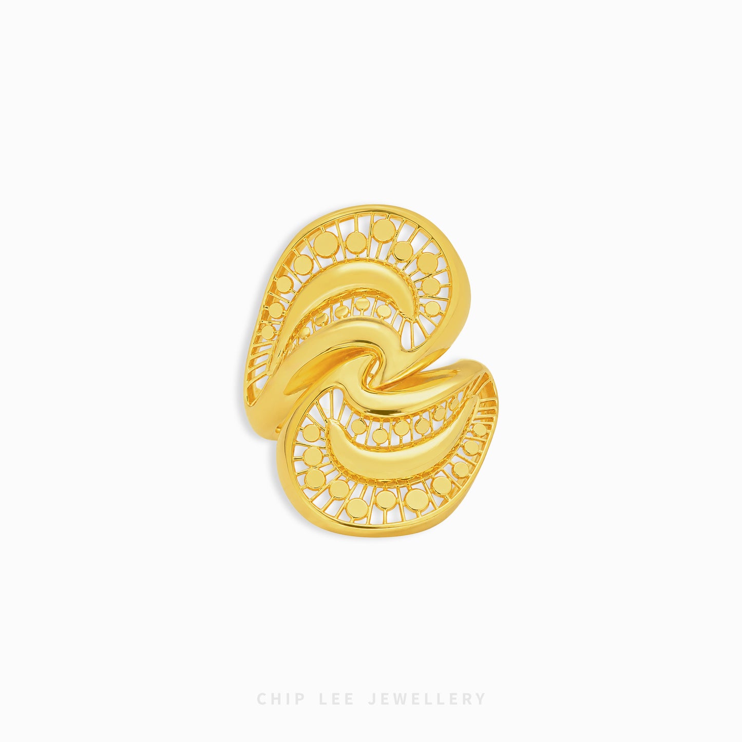 A gold-toned filigree ring with an abstract, flowing openwork design, shown on a plain white background with Chip Lee Jewellery branding at the bottom.