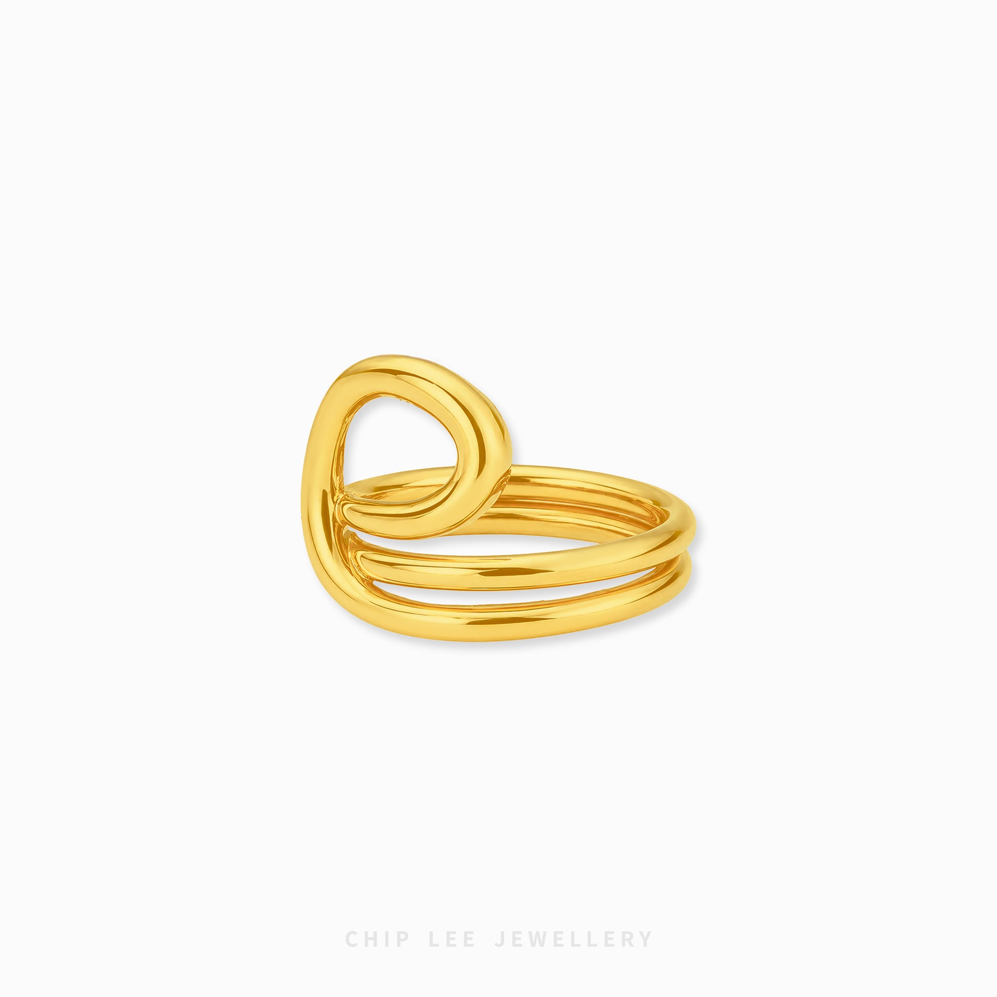 close-up 22K gold abstract loop ring with polished finish