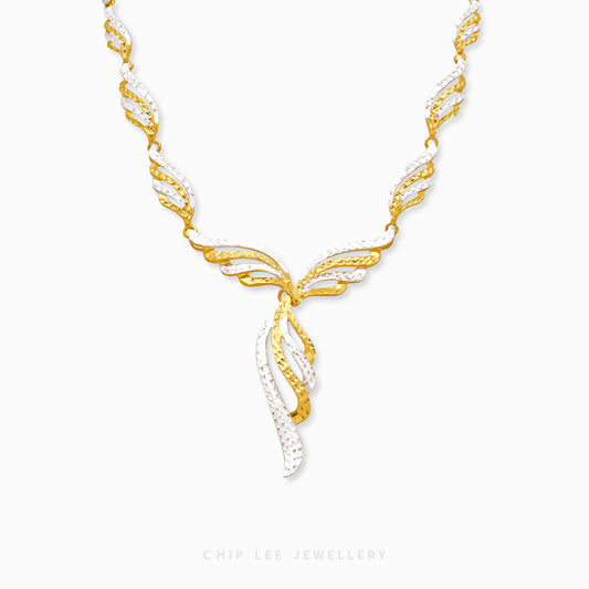 916 gold Seraphina wing design necklace with two-tone curved links and cascading wing-inspired centrepiece