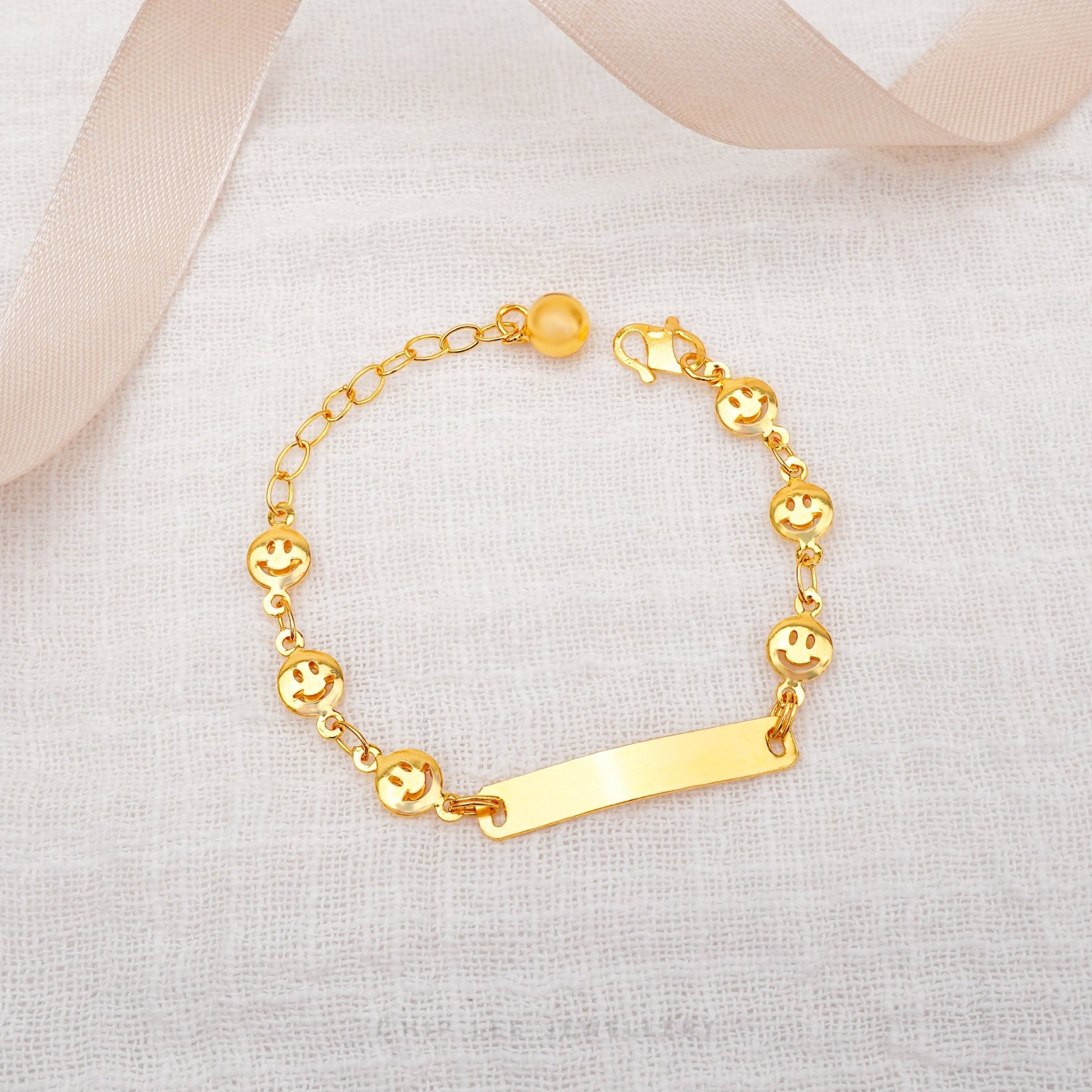 Smiley Baby Bracelet by Chip Lee Jewellery, 916 gold, featuring smiley face charms, symbolizing joy and positivity for newborns.