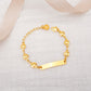 Smiley Baby Bracelet by Chip Lee Jewellery, 916 gold, featuring smiley face charms, symbolizing joy and positivity for newborns.