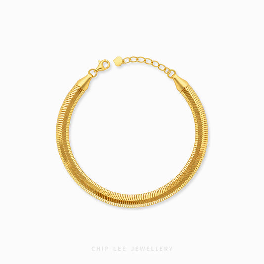 A gold snake chain bracelet with a lobster clasp and extension chain, displayed on a clean white background with the brand name 'CHIP LEE JEWELLERY' at the bottom.