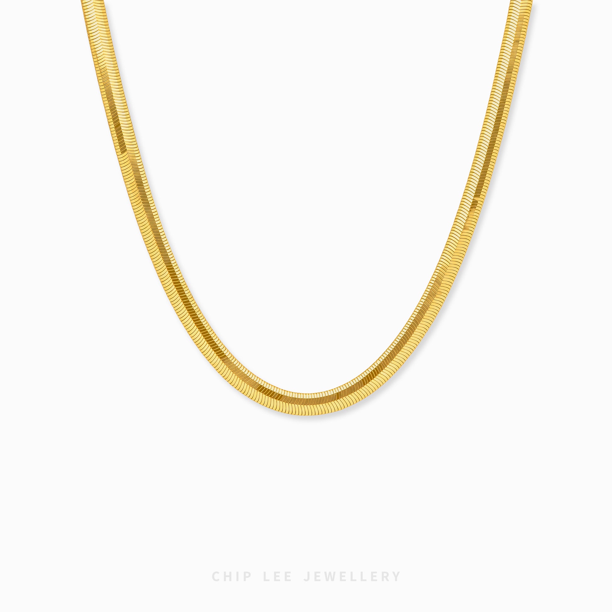 A close-up of a gold snake chain necklace against a plain white background, with the brand name 'CHIP LEE JEWELLERY' printed at the bottom.