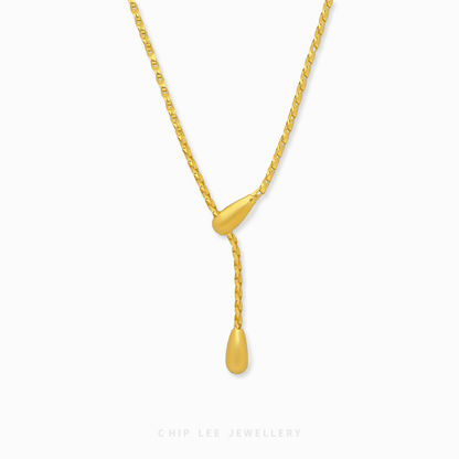 Versatile Spiga Lariat Necklace in 916 gold featuring an adjustable wheat chain weave and a polished teardrop finish.