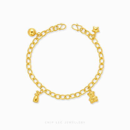 A gold chain anklet with small charms, including a teddy bear, a bottle, a star, and a ball, displayed on a clean white background with the brand name 'CHIP LEE JEWELLERY' at the bottom.