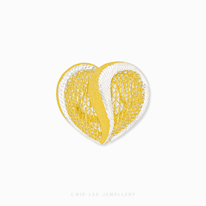 Bold duo-tone gold Statement Heart Ring with a chunky, weighty design, symbolizing unbreakable love and connection.