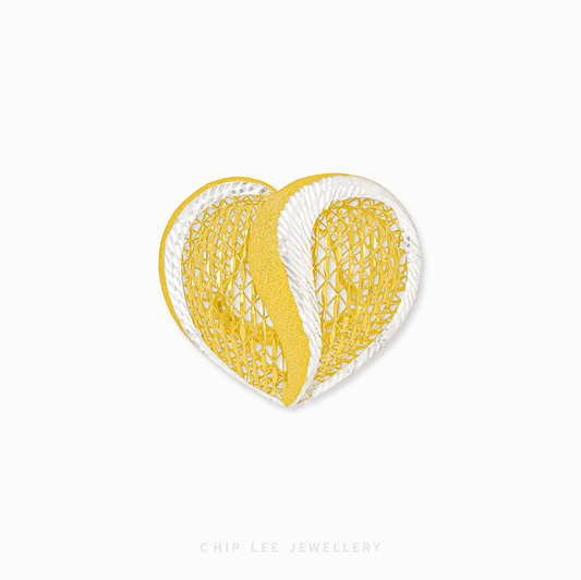 Bold duo-tone gold Statement Heart Ring with a chunky, weighty design, symbolizing unbreakable love and connection.