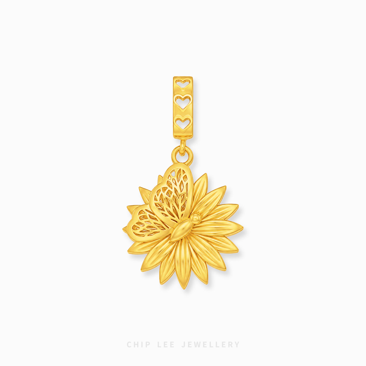 A gold flower-shaped pendant charm with a textured center and a bail featuring three heart-shaped cutouts, shown on a clean white background with a brand watermark at the bottom.