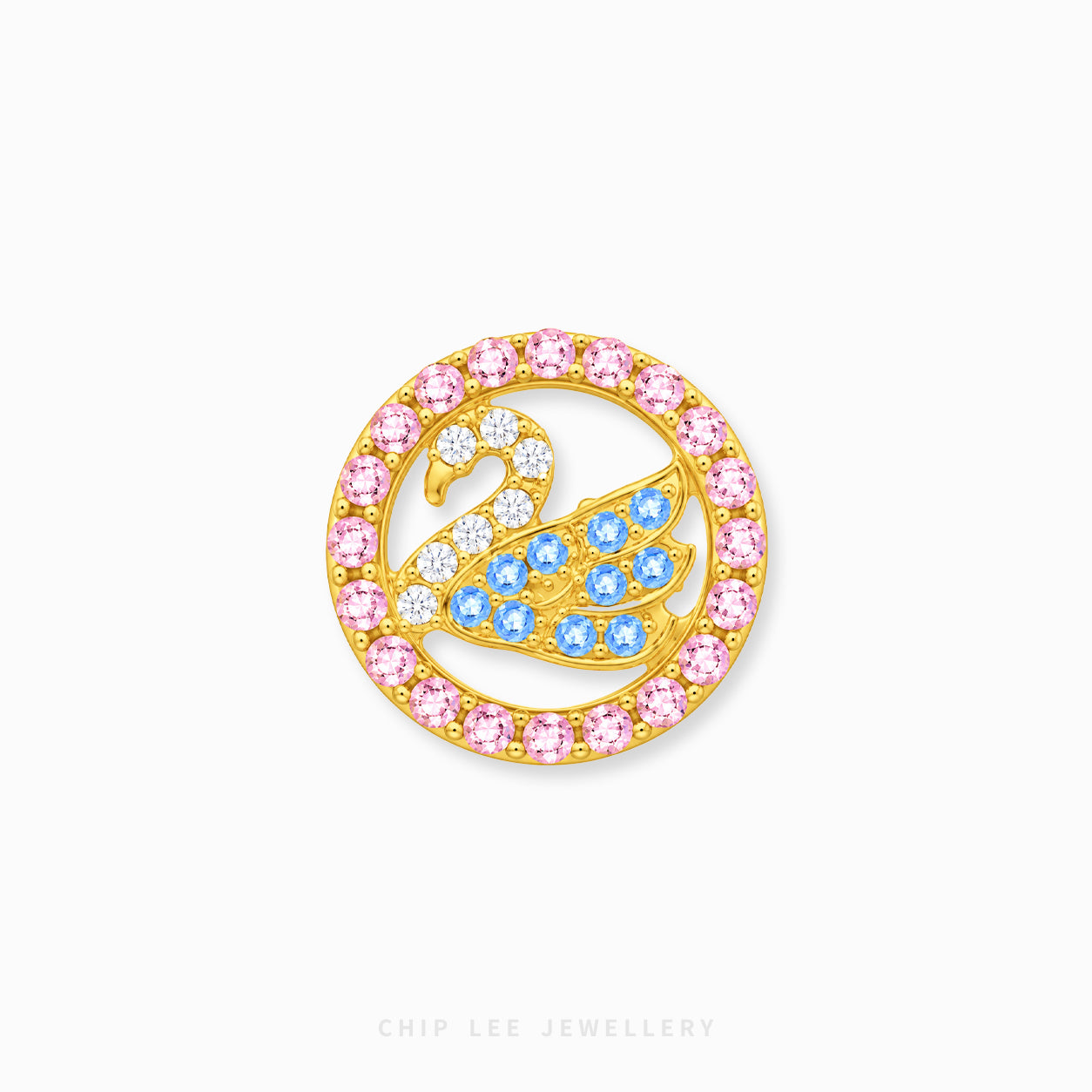 A gold-toned circular swan brooch by Chip Lee Jewellery, featuring a border of pink and clear crystals, with the swan body filled with pink and light blue crystals.