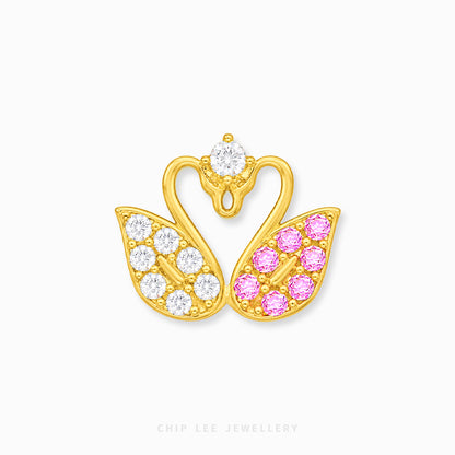 A gold-toned swan-shaped charm with clear round stones on one side and pink round stones on the other, shown on a plain light background. The brand name 'CHIP LEE JEWELLERY' appears faintly at the bottom.
