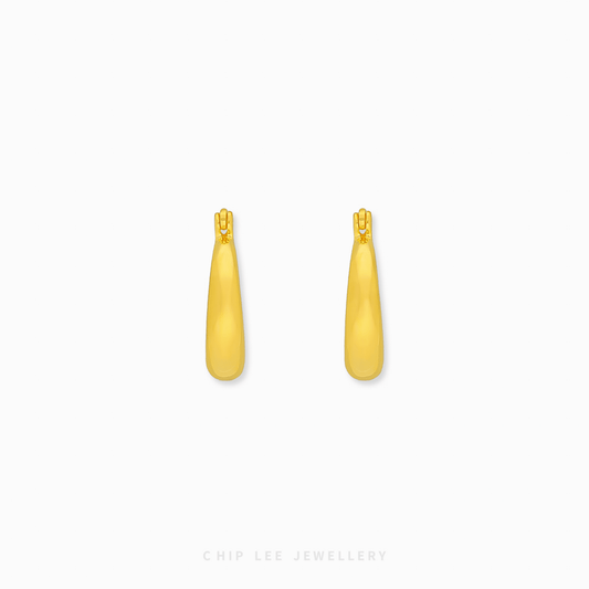 916 Gold Tapered Hoop Earrings by Chip Lee Jewellery Singapore. Sculptural, bold hoops symbolizing strength and unity. Thicker at the bottom.