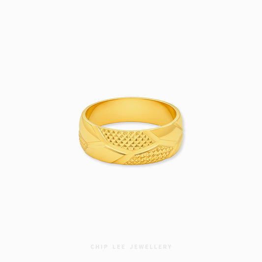 Gold ring with textured design on a white background, branded 'Chip Lee Jewellery'.