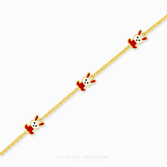 Trio Bunny Baby Bracelet by Chip Lee Jewellery, 916 gold, featuring three bunny charms, symbolizing joy and protection for newborns.