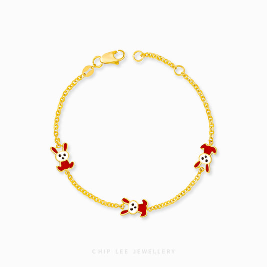 Trio Bunny Baby Bracelet by Chip Lee Jewellery, 916 gold, featuring three bunny charms, symbolizing joy and protection for newborns.