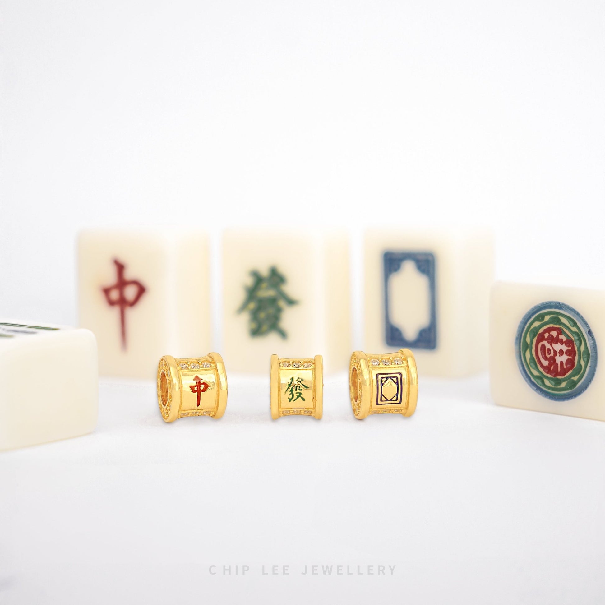 Trio Mahjong Charm with three classic Mahjong tiles crafted in solid gold, ideal for cultural and stylish jewellery accessories or gifts.