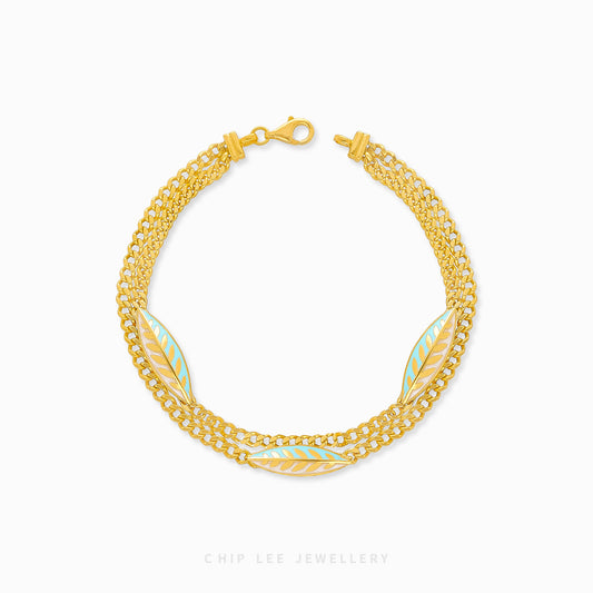 916 gold Turquoise Enamel Ethereal Leaf bracelet with botanical charm, hallmarked in Singapore. Lightweight and vibrant for effortless elegance.
