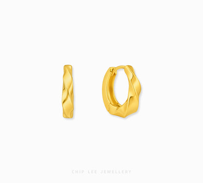 A pair of gold huggie hoop earrings with a twisted, textured surface, shown on a clean white background with the brand name 'CHIP LEE JEWELLERY' at the bottom.