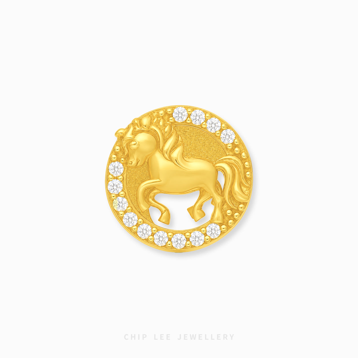 A gold circular charm featuring a detailed horse design in the center, surrounded by a border of small clear stones, shown on a plain white background with a Chip Lee Jewellery watermark at the bottom.