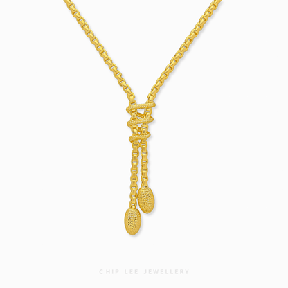 Venetian Cascade Lariat Necklace in 916 and 999 gold featuring elegant box links and a sophisticated drop design.