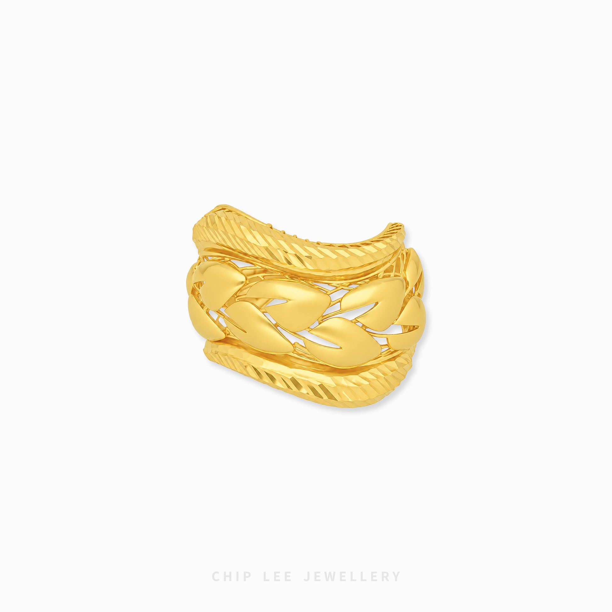 A gold-toned multi-band ring with a textured, braided cable design, shown on a plain white background with a brand watermark at the bottom.