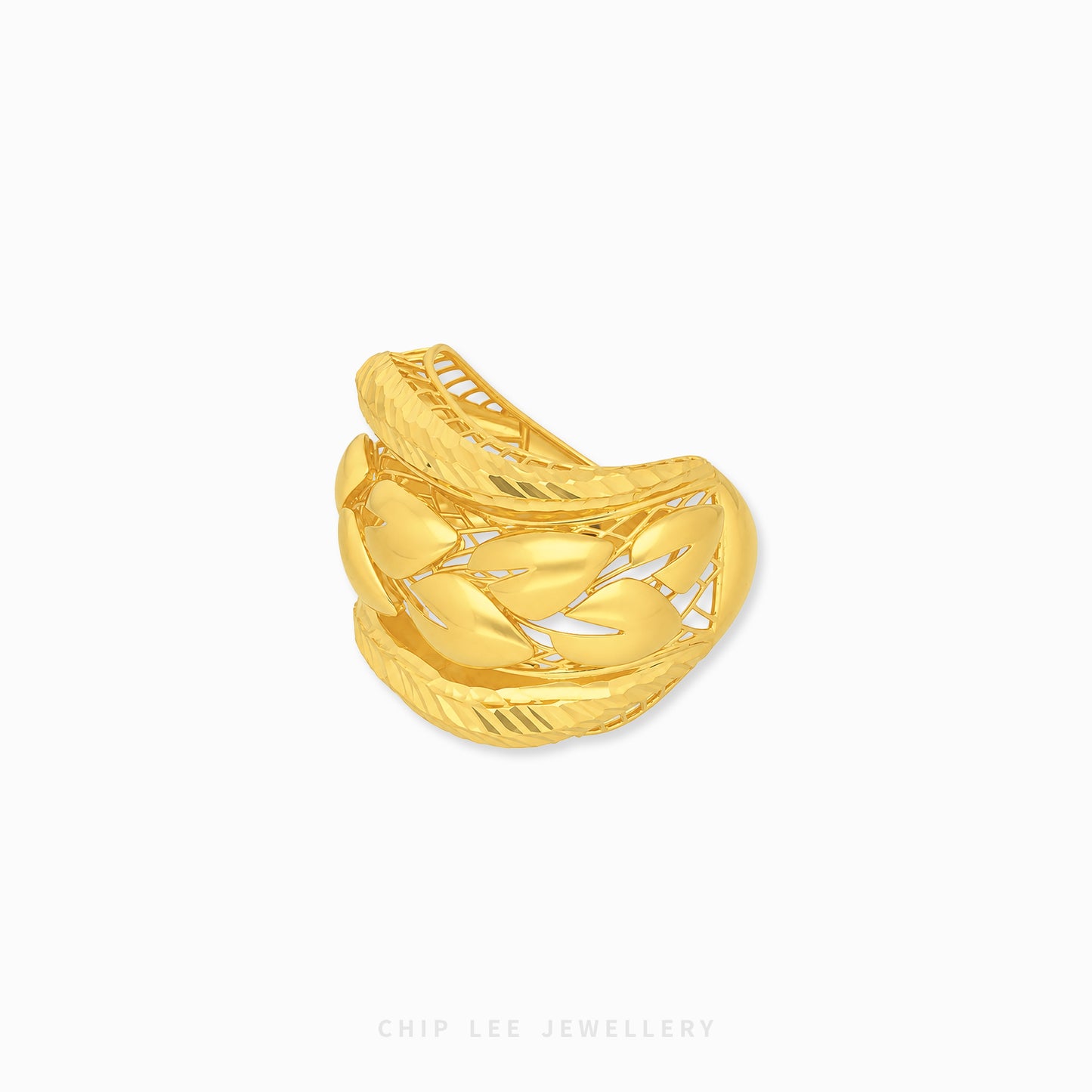 A gold leaf-patterned wrap ring by Chip Lee Jewellery, displayed on a clean white background.